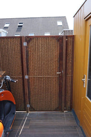 Kokos tuindeur in cortenstalen frame